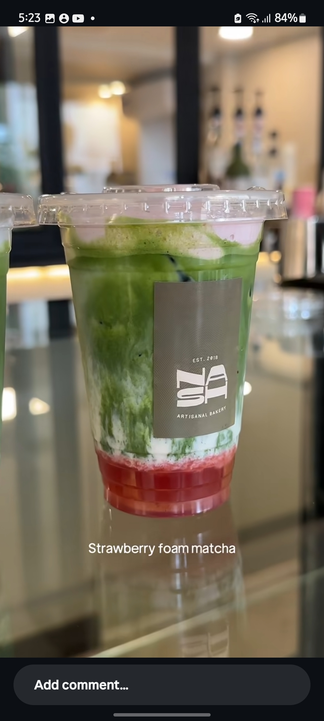Strawberry Foam Matcha — vibrant layers in a NASH cup